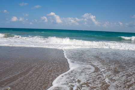 wave sand and sea. Nature landscape view of beautiful tropical beach and sea in sunny day. beach space areaの写真素材