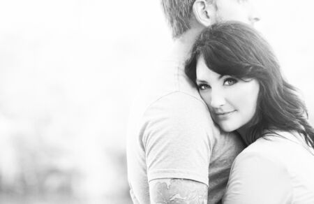 Portraite of a happy couple outdoors in the park の写真素材