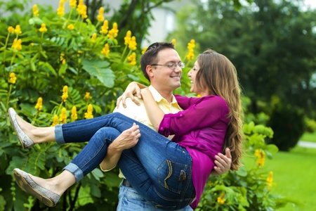 Portraite of a happy couple outdoors in the park の写真素材