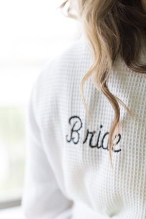 Bride dressed in a robe inside a room before the weddingの写真素材