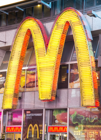 NEW YORK - DECEMBER 22, 2013: sign-logo of the chain Mc Donald's  in Times Square,New York.のeditorial素材