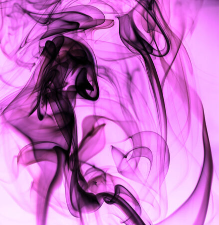 colored purple smokeの写真素材