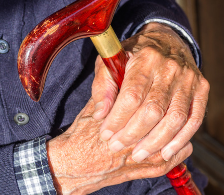 old man hands and stickの写真素材