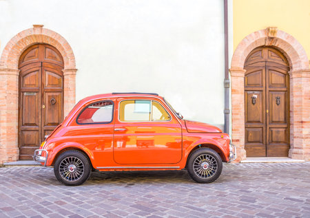 RIMINI,ITALY - MAY 17,2014: Fiat 500 car on the street. Fiat 500 is among Top 50 cars in automotive history. Nowadays it is desired by collectors.のeditorial素材