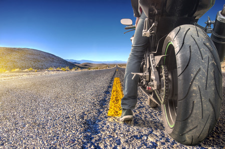 Road crossing the Death Valleyの写真素材