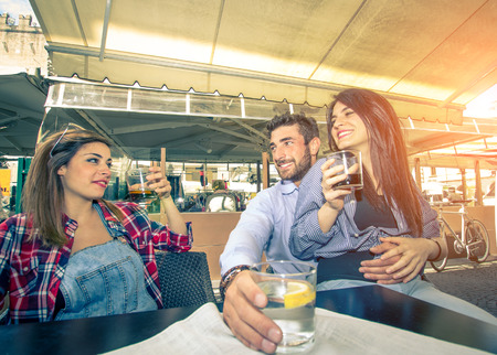 friends having a drink in a cafe