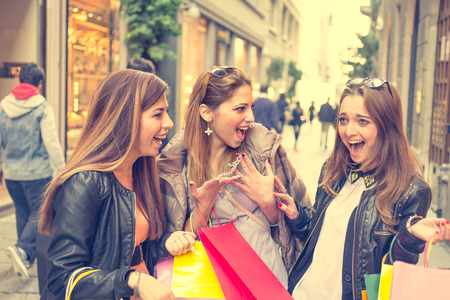 happy girls after shoppingの写真素材