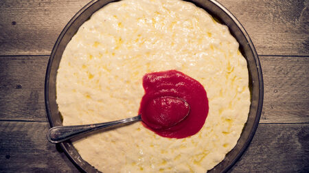 Handmade pizza margherita preparation- Candid image of italian pizza recipeの写真素材