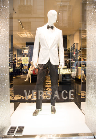 MILAN,ITALY - DECEMBER 30, 2014: mannequin exposed on Versace boutique window.Versace is a world famous fashion brand.のeditorial素材