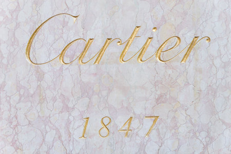 MILAN,ITALY - DECEMBER 30, 2014: Cartier logo.Cartier  is a world famous clock and jewelery brandのeditorial素材