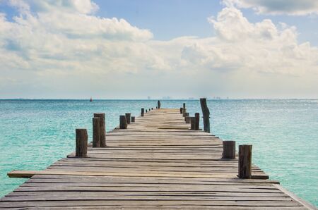 Tropical beach and pierの写真素材