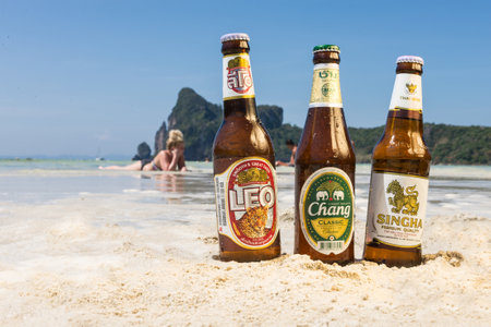 PHI PHI ISLAND,THAILAND - FEBRUARY 27,2015: Chang,Singha and Leo beer are the most famous beer and produced by Asia's largest beverage companiesのeditorial素材