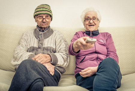 old couple watching tvの写真素材