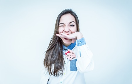 woman expression. asian woman biting her hand. multi conceptual imageの写真素材