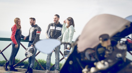 group of bikers making excursion in the weekend. concept about transportation, motorbikes, leisure, fun, couples and peopleの写真素材