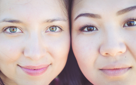 two young women portrait. concept about diversity, beauty and peopleの写真素材
