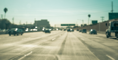 Blurred image on the freeway in Los Angeles, california. concept about traffic jam and...