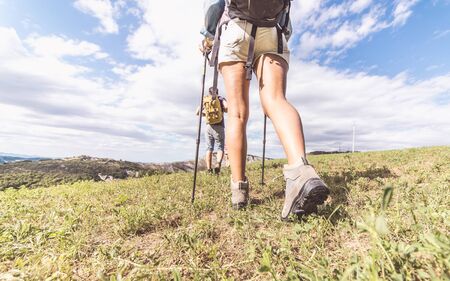 group of trekkers making an excursion. close up from the bootsの写真素材