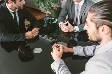 Business meeting in the office. manager and employers deciding on the strategyの写真素材
