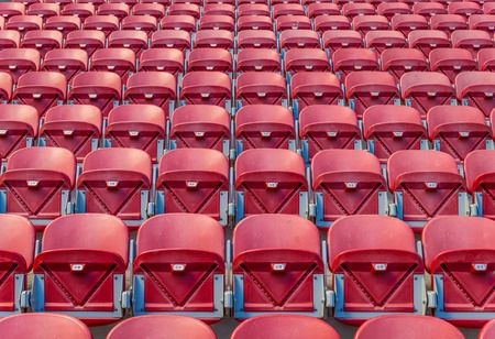 Red seats at the stadiumの写真素材