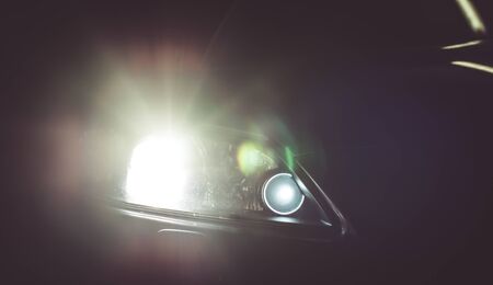 Sport car light turning on in the night. Concept about transportationの写真素材
