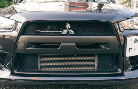 Tokyo, Japan. February 9th, 2015. The Mitsubishi Lancer evo front spoiler. It is a high performance sports sedan manufactured by Mitsubishi Motors that is based on the normal Lancerのeditorial素材