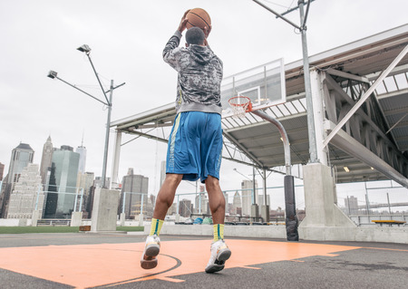 Basketball player playing on the court.