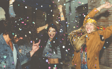 Group of friends making party outdoor in the nightの写真素材