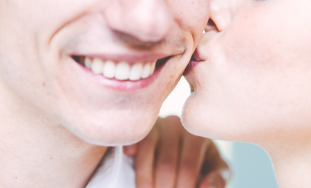 couple kiss close up. woman kissing her man chick. concept about loveの写真素材