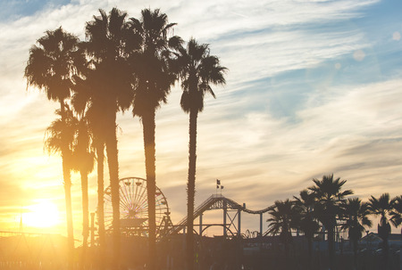 Santa monica pier with palm silhouettesの写真素材