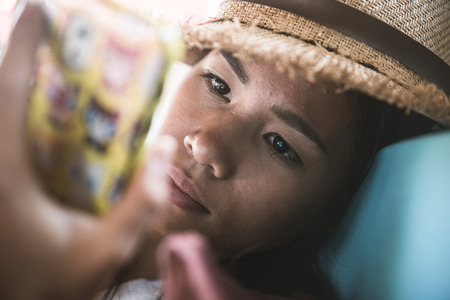 Thai woman using smart phoneの写真素材