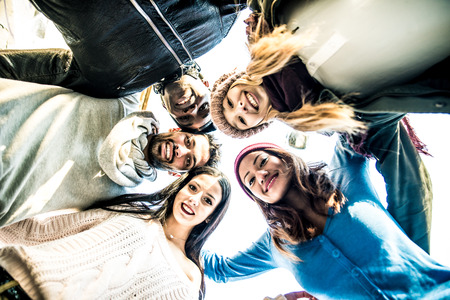 Group of friends smiling from above