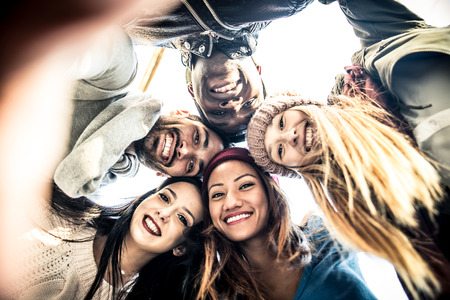 Group of friends smiling from above