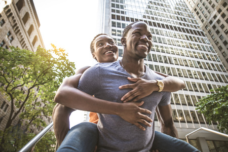 Smiling couple of lovers having fun in New York streetsの写真素材