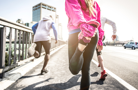Urban runners making stretchingの写真素材
