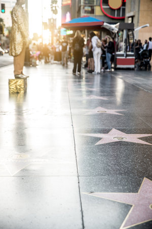HOLLYWOOD, CA - OCTOBER 12, 2016: People visit Walk of Fame in Hollywood. Hollywood Walk of Fame features more than 2,500 stars with inscribed celebrity names.のeditorial素材