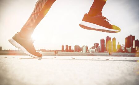 Low section of sport man running in New york