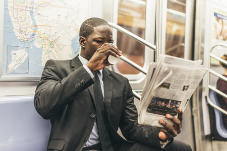 Businessman in full suit in New York subway metroのeditorial素材