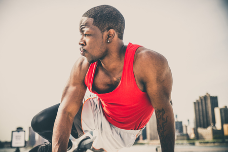 Sportive man training outdoors - Runner jogging, healthy lifestyle and sport conceptの写真素材