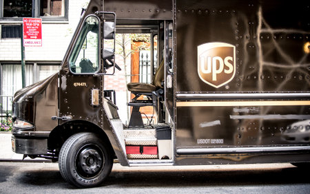 NEW YORK, PARK AVENUE, USA. September 16 2016. UPS delivery truck on a street.  (UPS) is the world's largest package delivery companyのeditorial素材