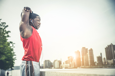 Sportive man training outdoorsの写真素材