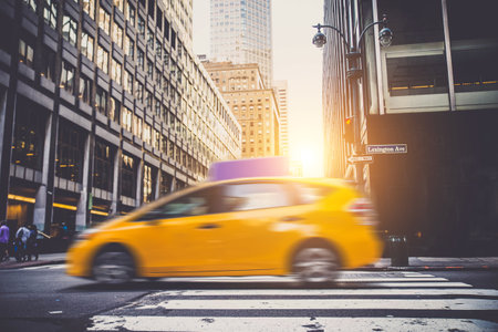 A cab driving on the streets of New York Cityのeditorial素材