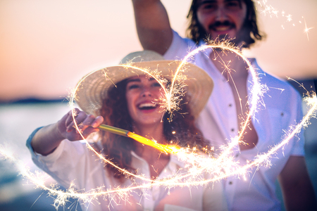 Young couple sharing happy  and love mood on the beachの写真素材
