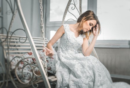 Breautiful woman in white dressの写真素材