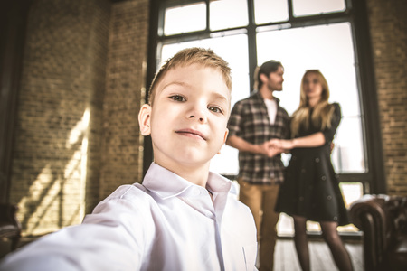 Family home portrait. Parents and son spending time togetherの写真素材