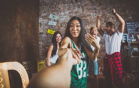 Friends hanging out at homeの写真素材