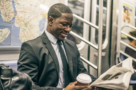 Businessman in full suit in New York subway metro