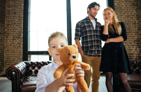 Family home portrait. Parents and son spending time togetherの写真素材