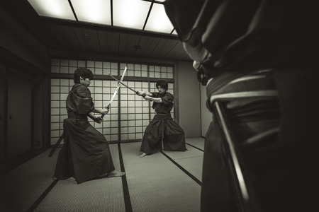 Samurai training in a traditional dojo, in Tokyo