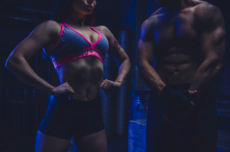 Young people making functional training in the grungy gymの写真素材